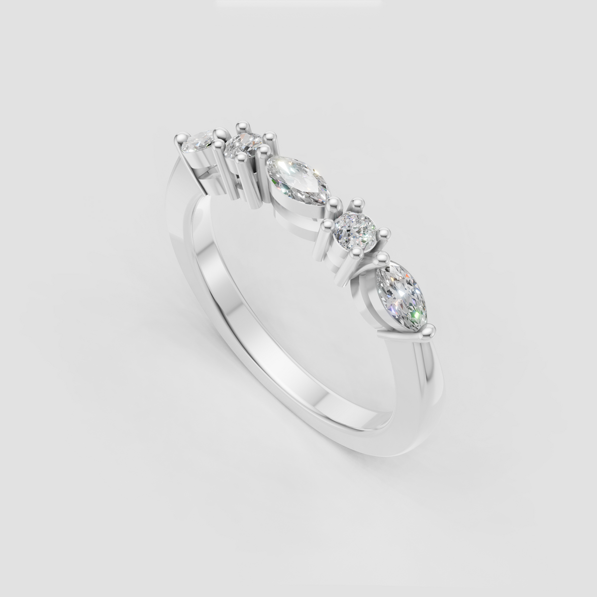 Marquise diamond bridal ring with round and oval side stones