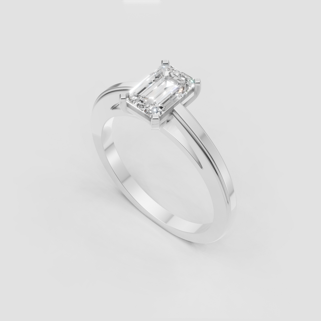 Emerald cut canter diamond secured by four refined prongs