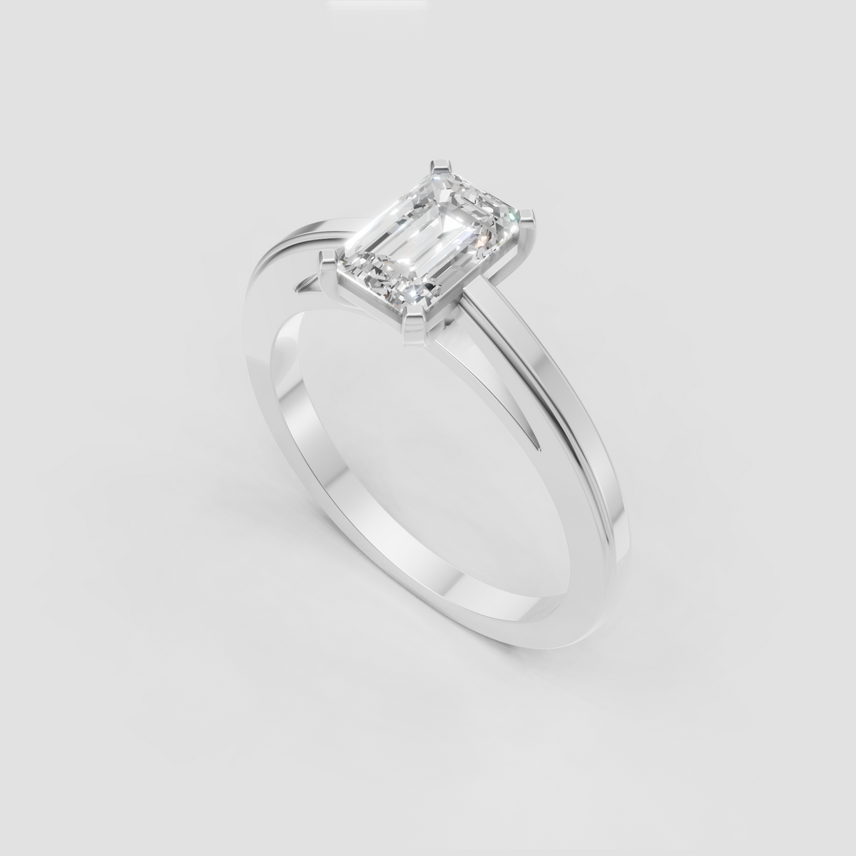 Emerald cut canter diamond secured by four refined prongs