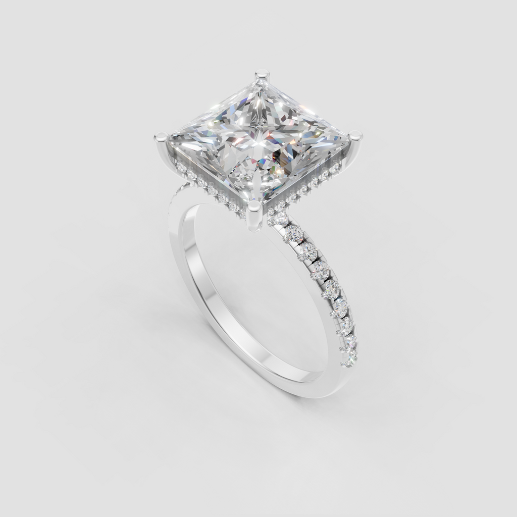 Yellow gold princess cut diamond solitaire ring with hidden halo and pavé band
