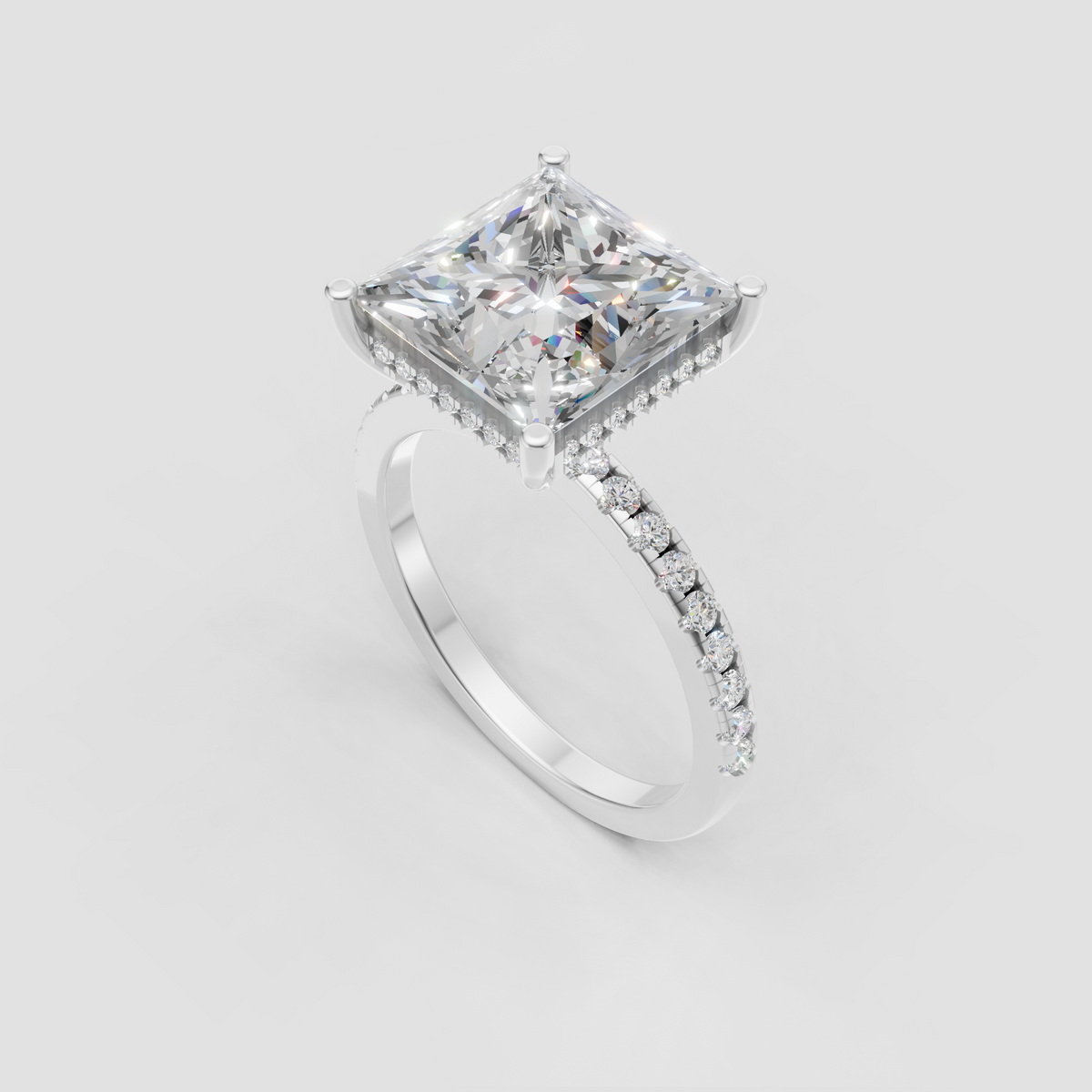 Yellow gold princess cut diamond solitaire ring with hidden halo and pavé band