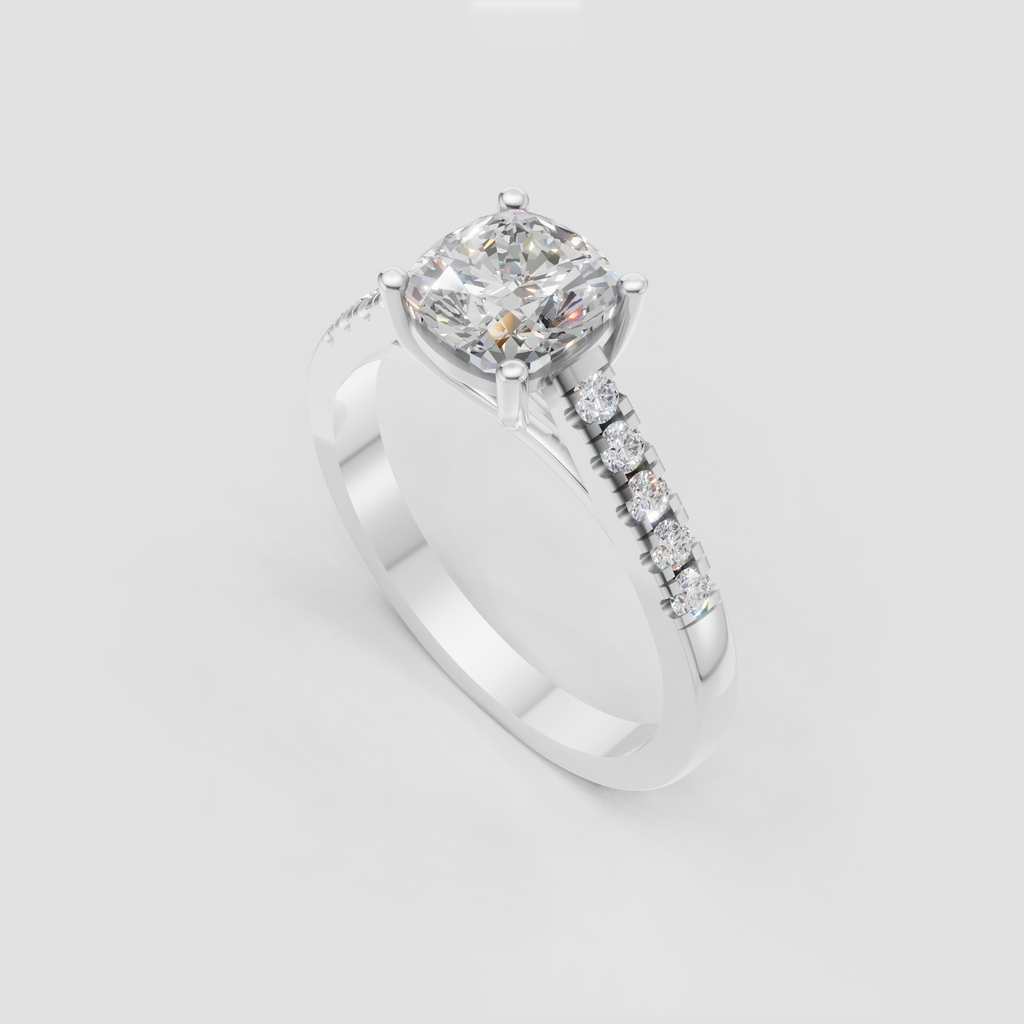 Cushion cut center diamond in refined four-prong setting