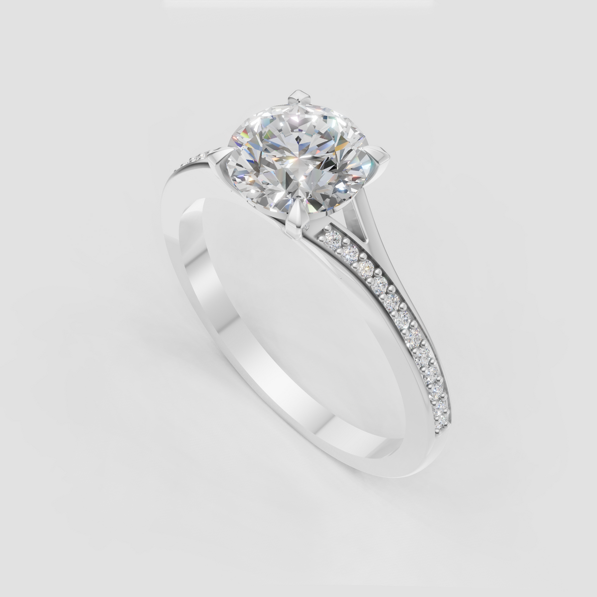 Round brilliant engagement ring with sparkling side stones