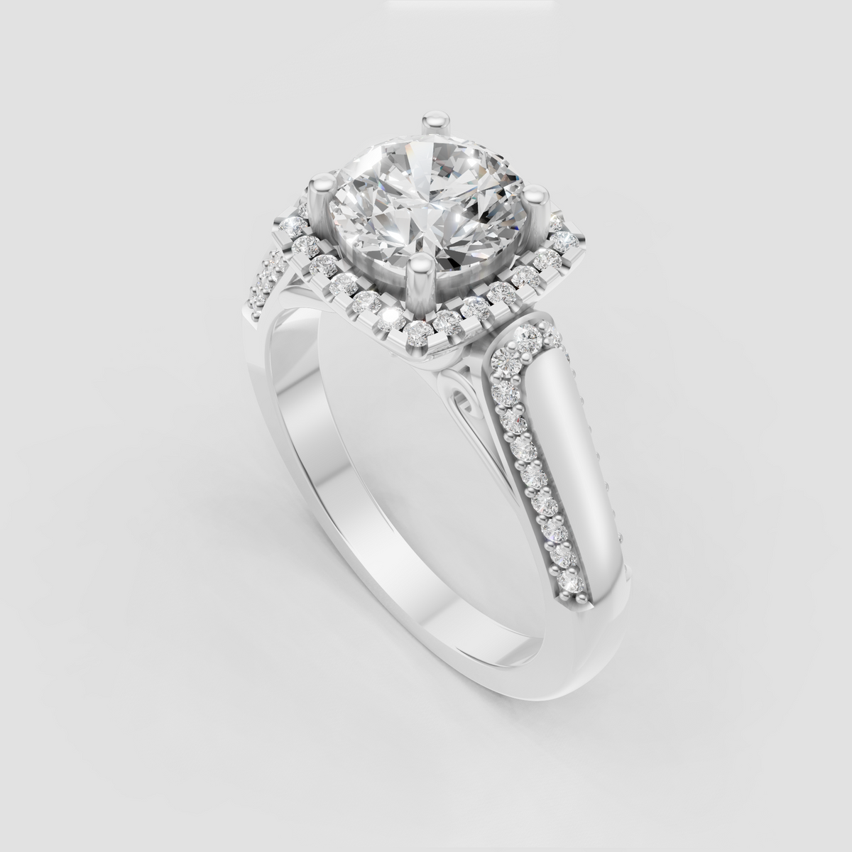Yellow gold halo engagement ring with pavé-set diamond shoulders