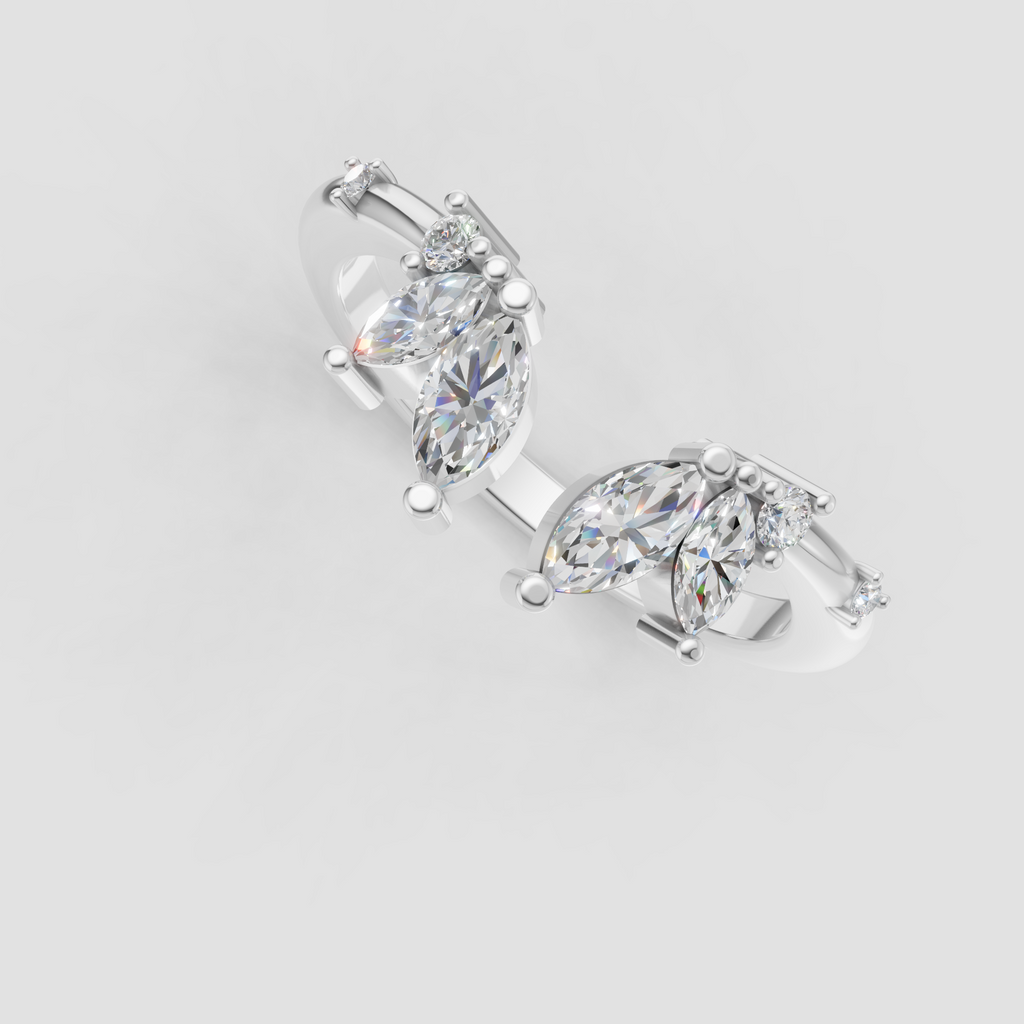 Marquise and round diamond band with delicate prong details