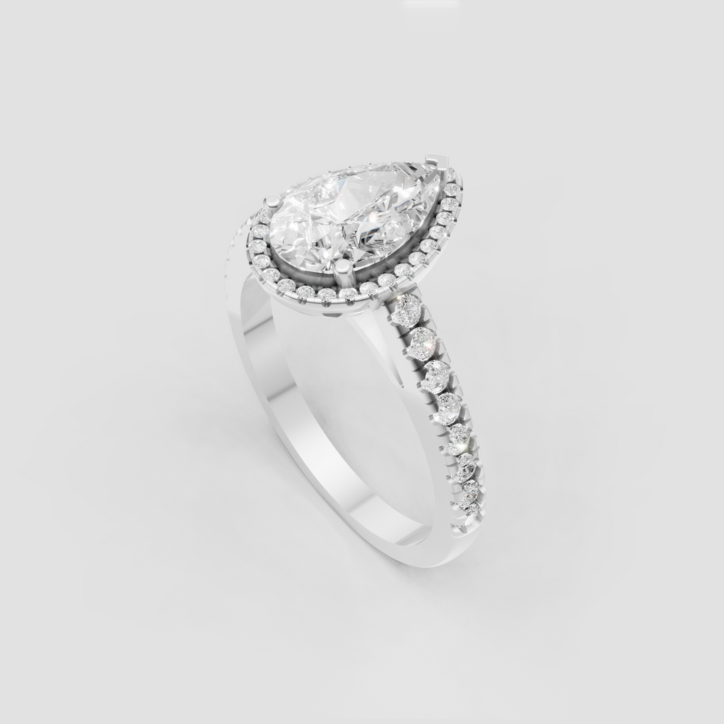Luxury pear shaped diamond engagement ring in polished yellow gold