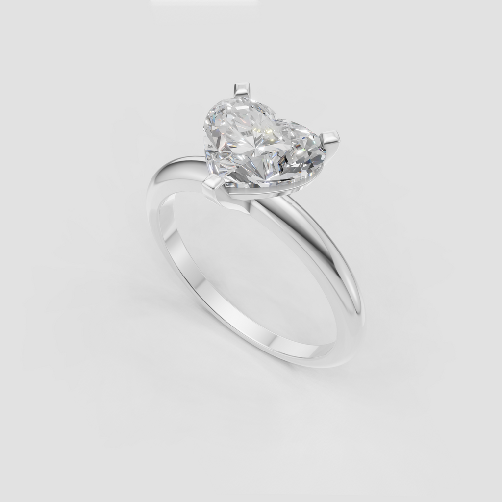 Romantic heart shaped diamond engagement ring in yellow gold