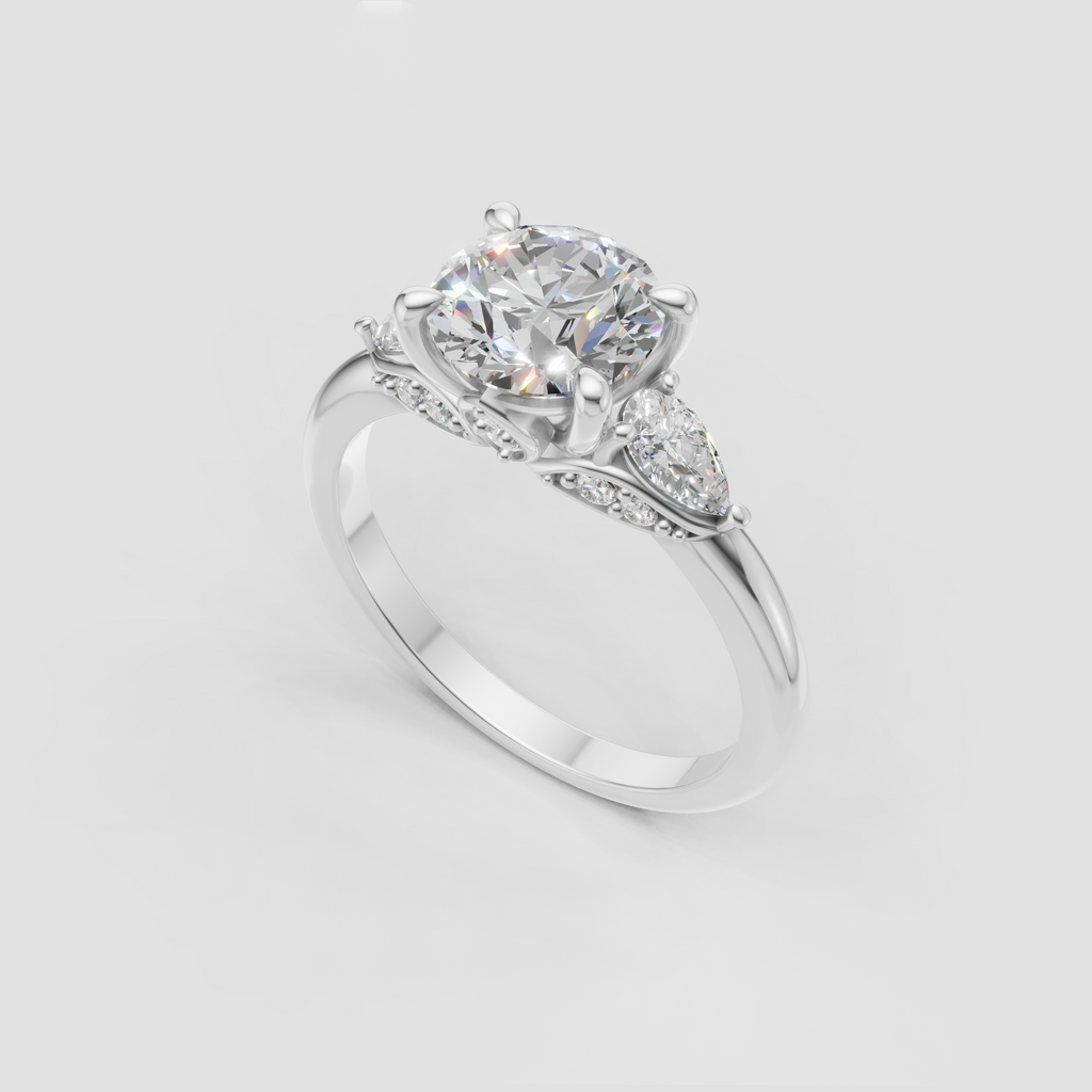 Elegant three stone engagement ring with polished yellow gold band