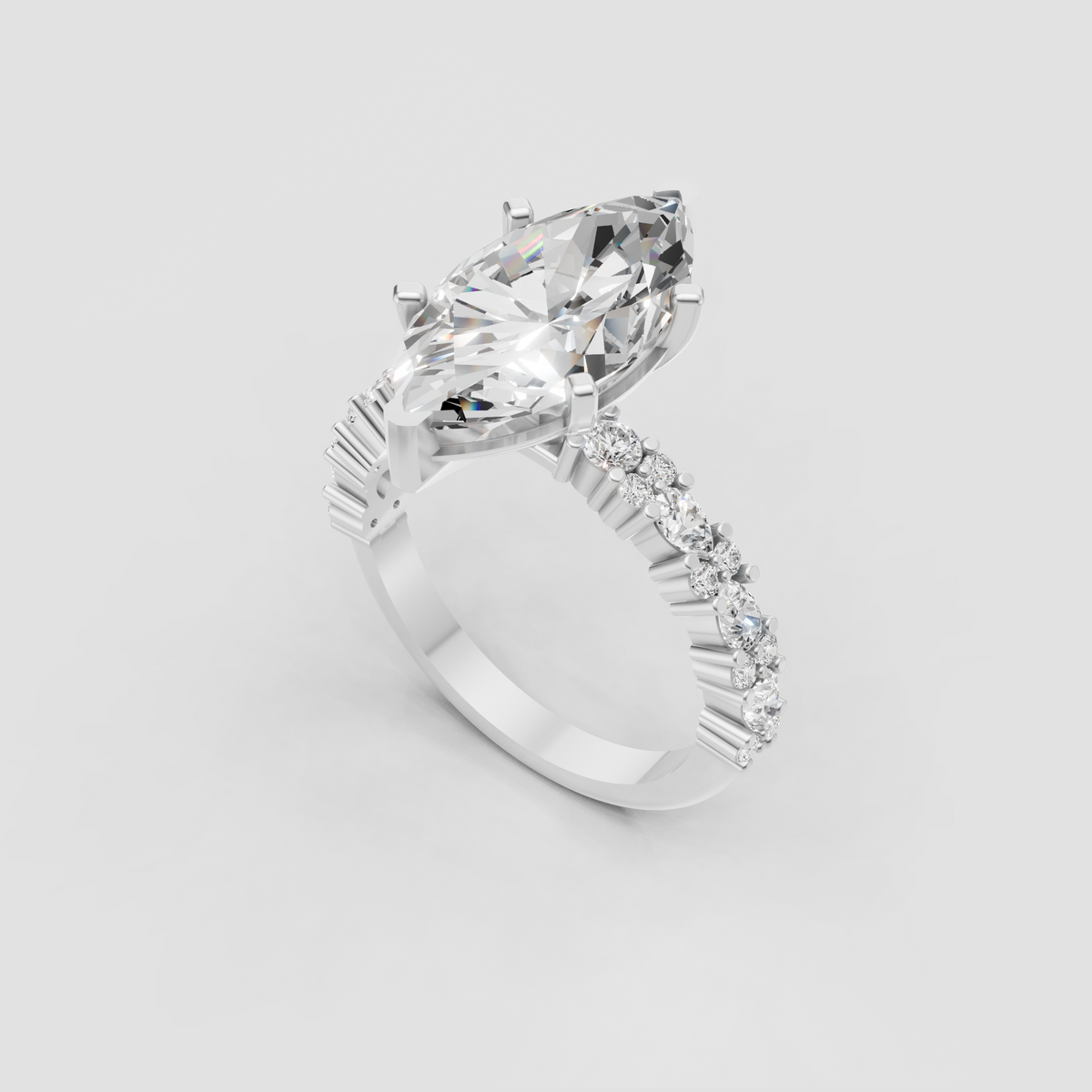 Four-prong marquise diamond engagement ring with ornate side stone detailing