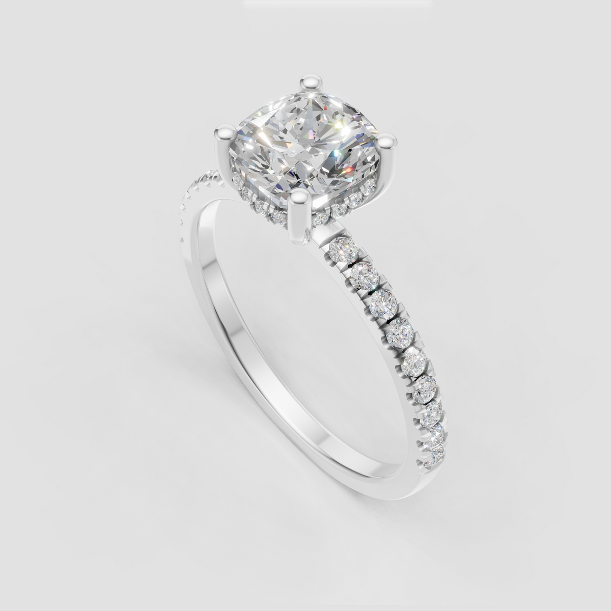 Luxury cushion diamond engagement ring with pavé shoulders