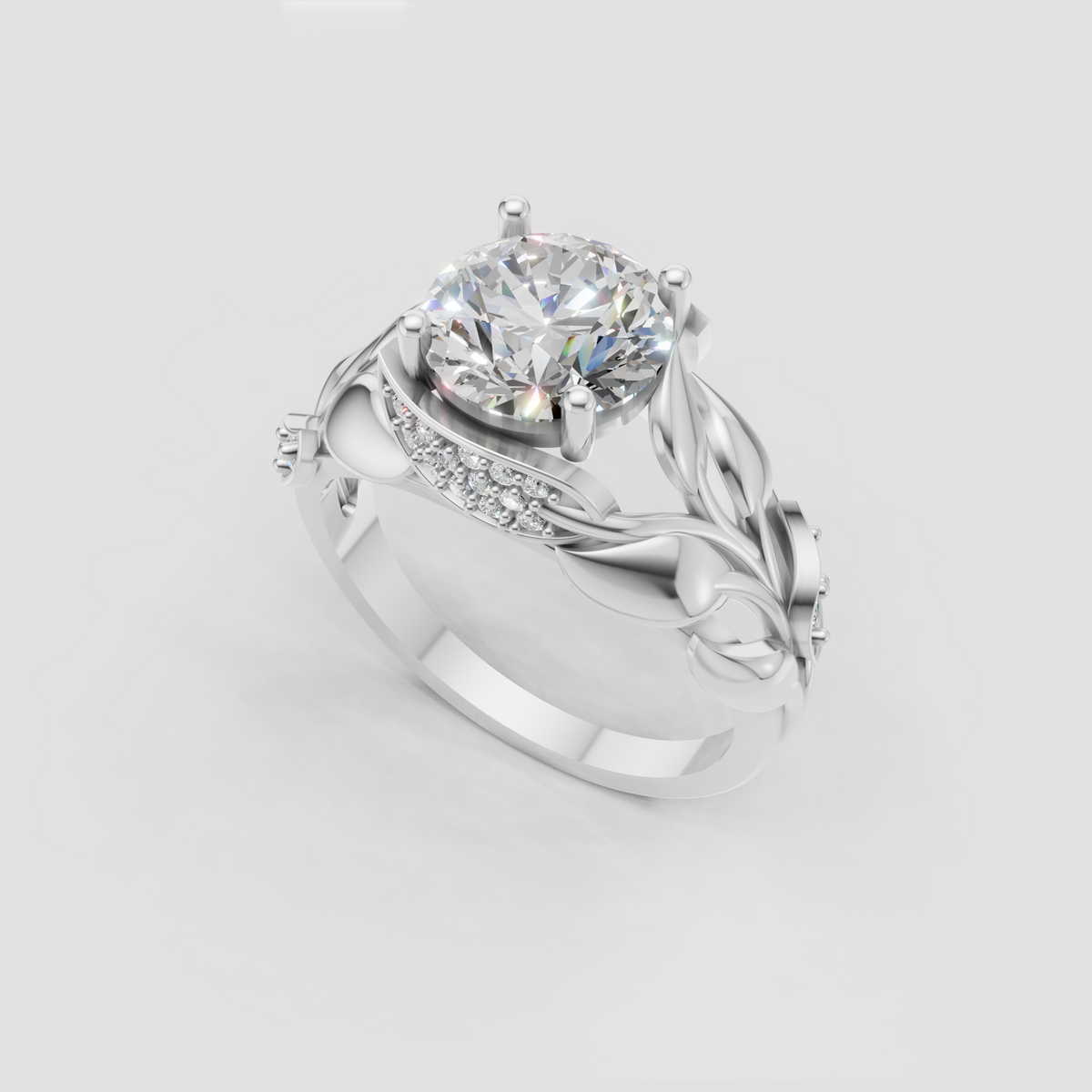 Round diamond ring featuring leaf and vine shoulder detailing