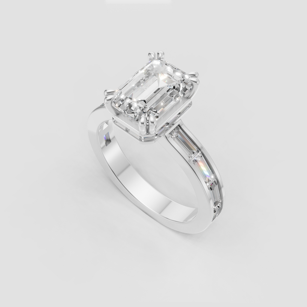 Emerald diamond solitaire ring with four-prong setting and architectural baguette accents