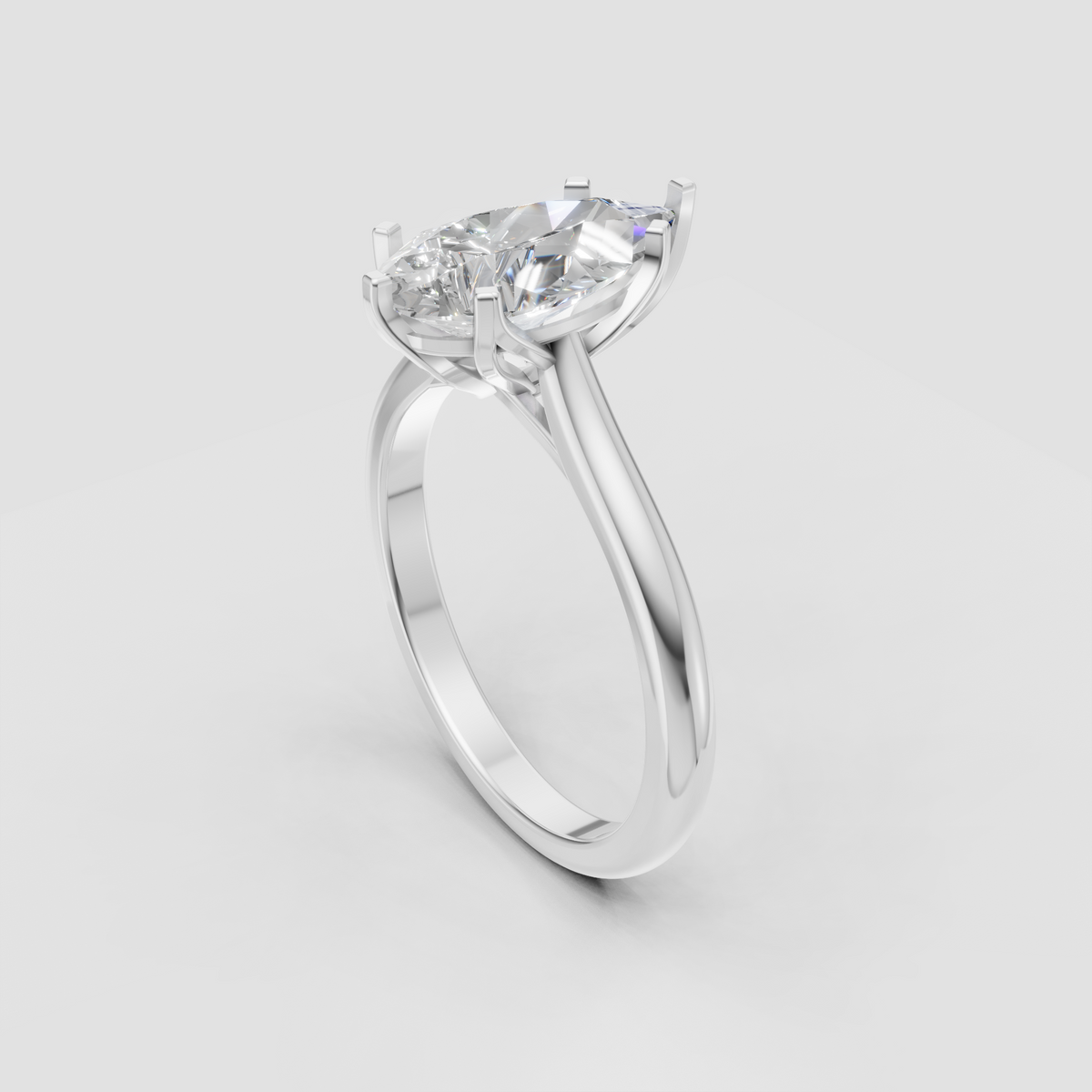 Luxury pear diamond engagement ring with cathedral prong setting
