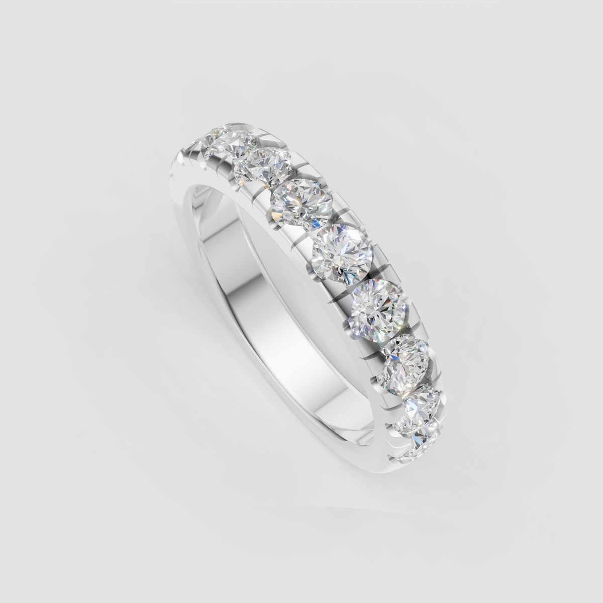 Elegant round diamond anniversary band with open prong detailing