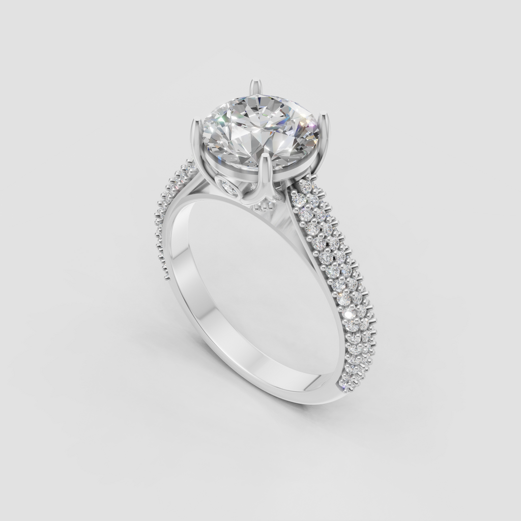 Four-prong round cut diamond ring in yellow gold