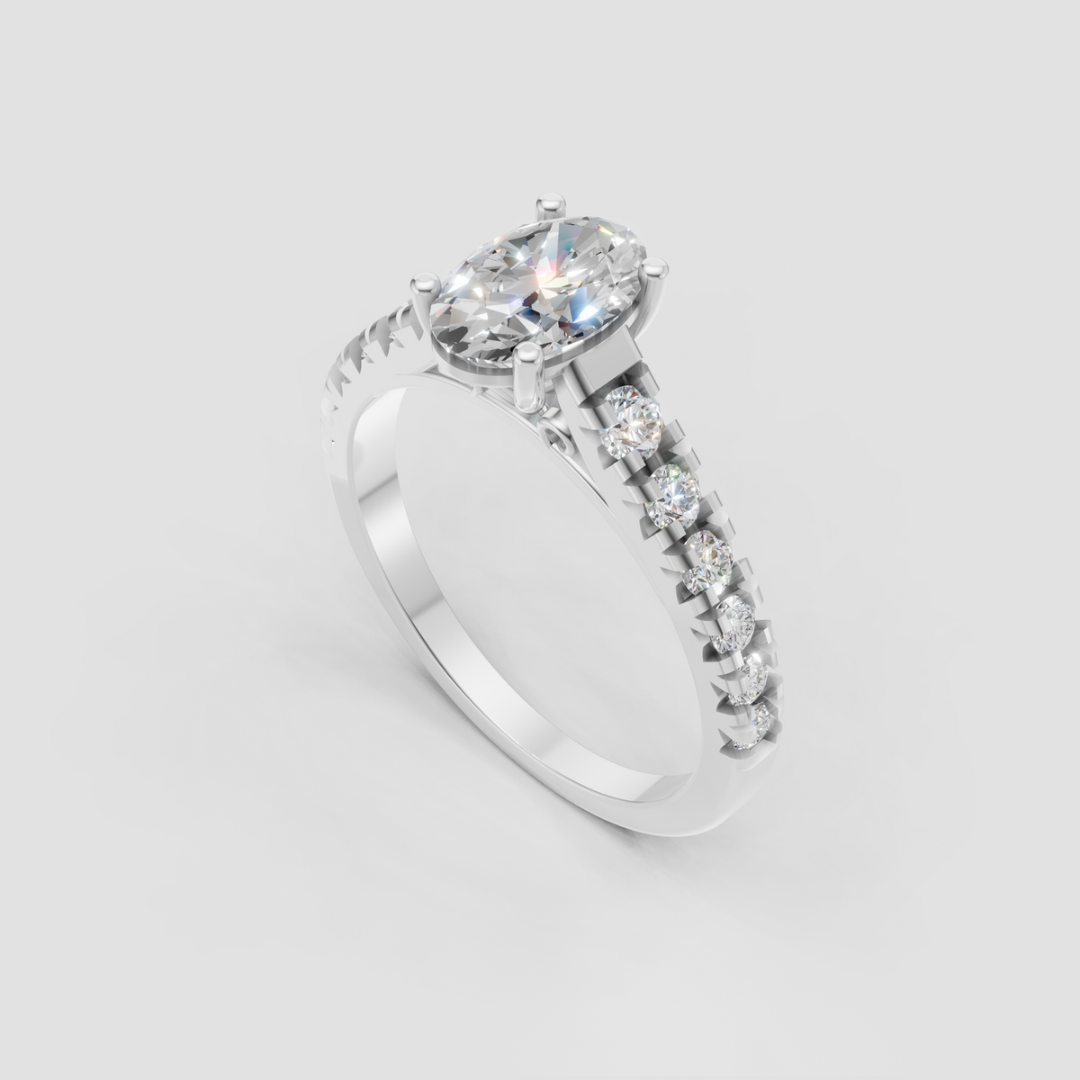 Oval cut diamond ring with round accent stones along the band