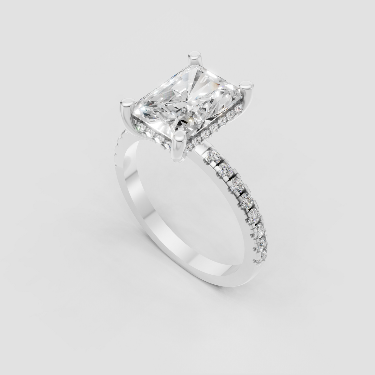 Modern radiant cut diamond ring with hidden diamond halo