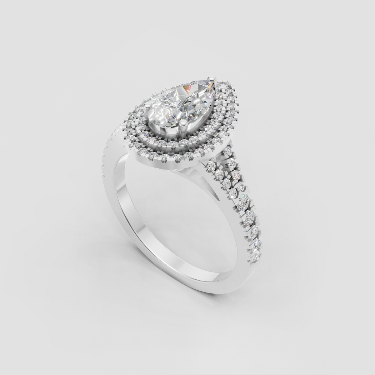 Pear cut diamond ring with sparkling concentric halos