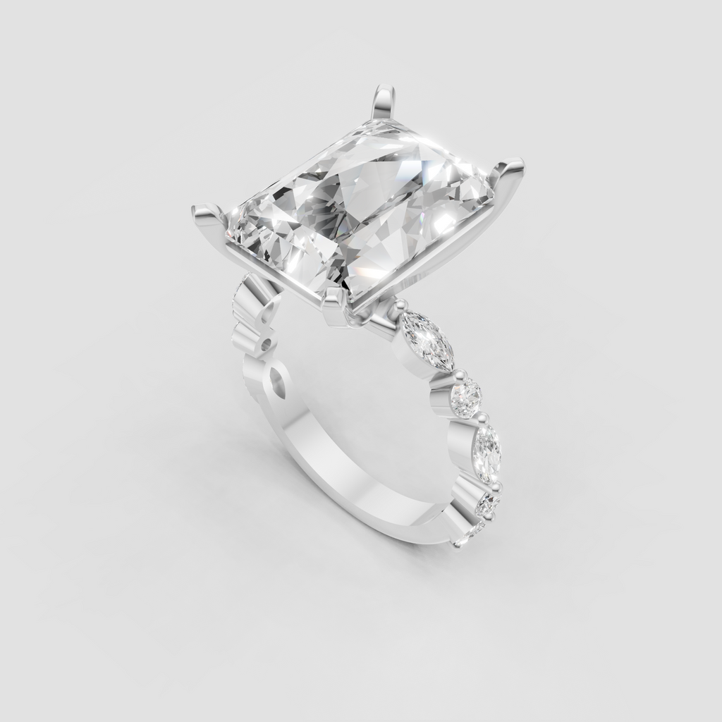 Elongated radiant cut diamond ring with brilliant side stone detailing