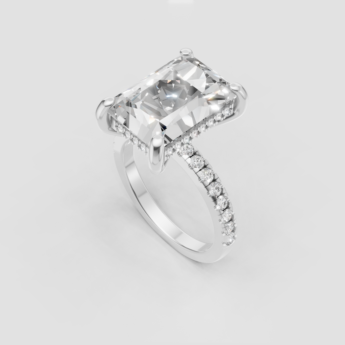 Radiant cut center Diamond ring with hidden halo and round accent stones