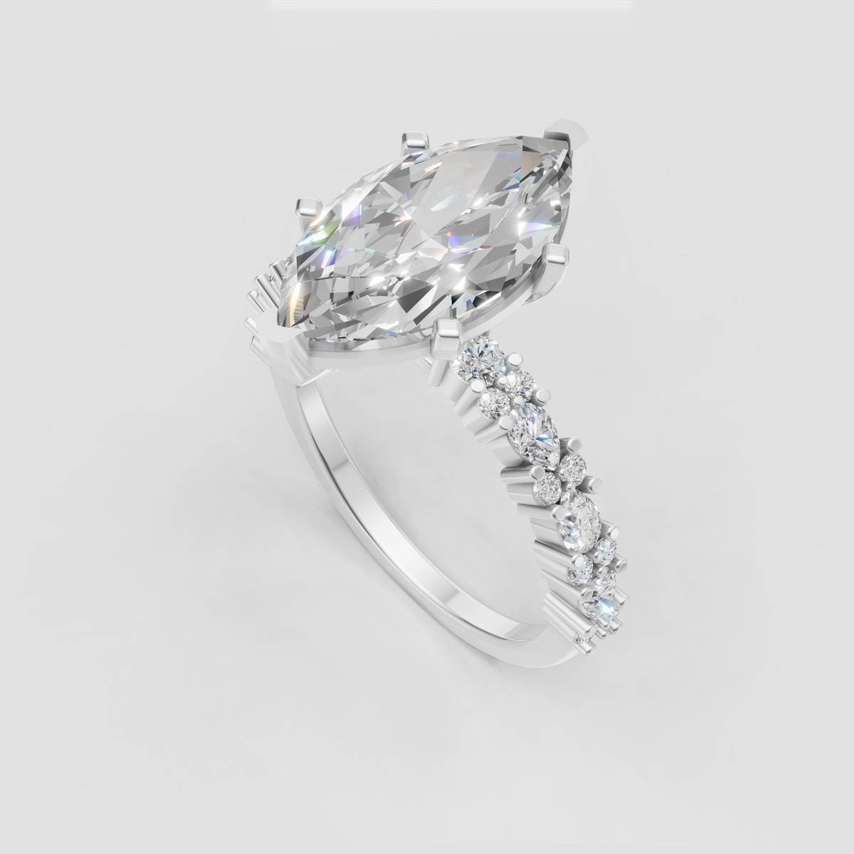 Marquise diamond ring with pear and round diamonds