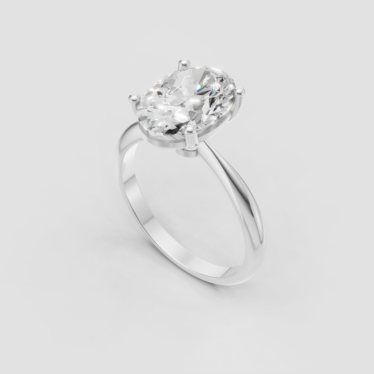 Oval Diamond four-prong engagement ring with elevated basket-style gallery