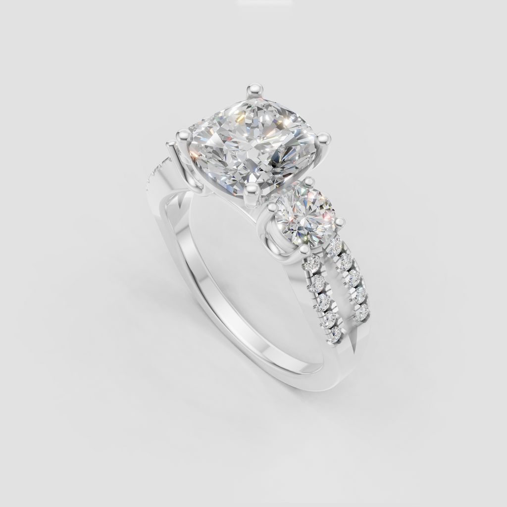 Elegant cushion cut three stone engagement ring
