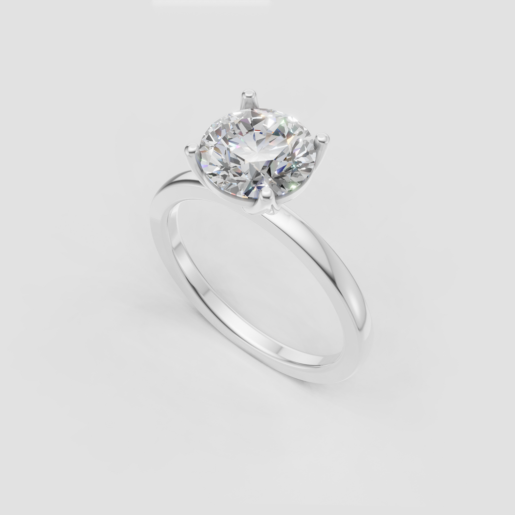 Round diamond engagement ring with sculpted cathedral shoulders