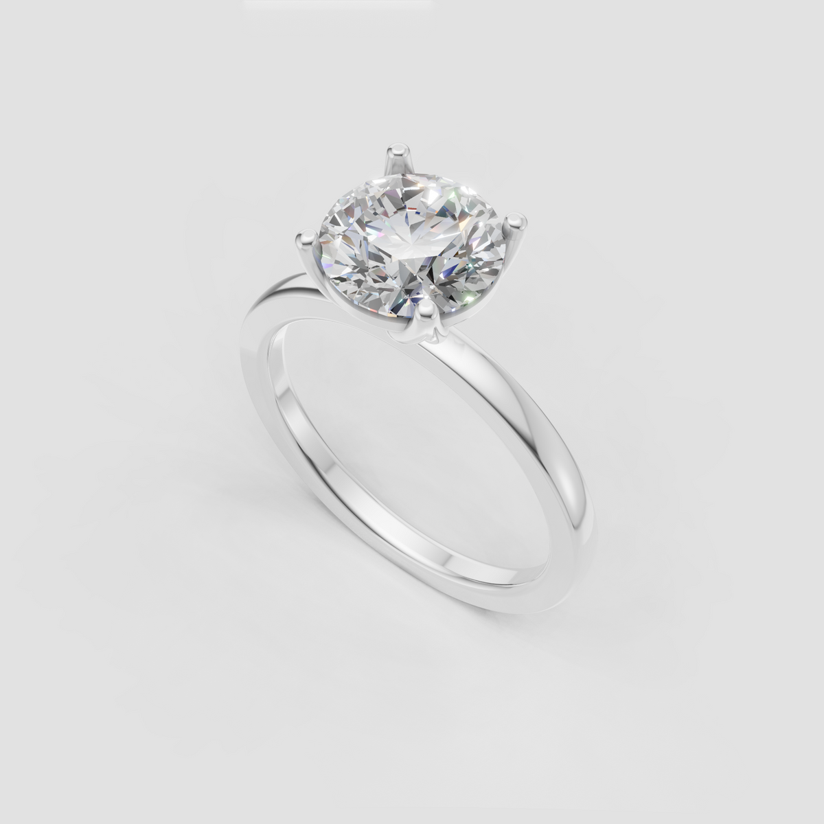 Round diamond engagement ring with sculpted cathedral shoulders