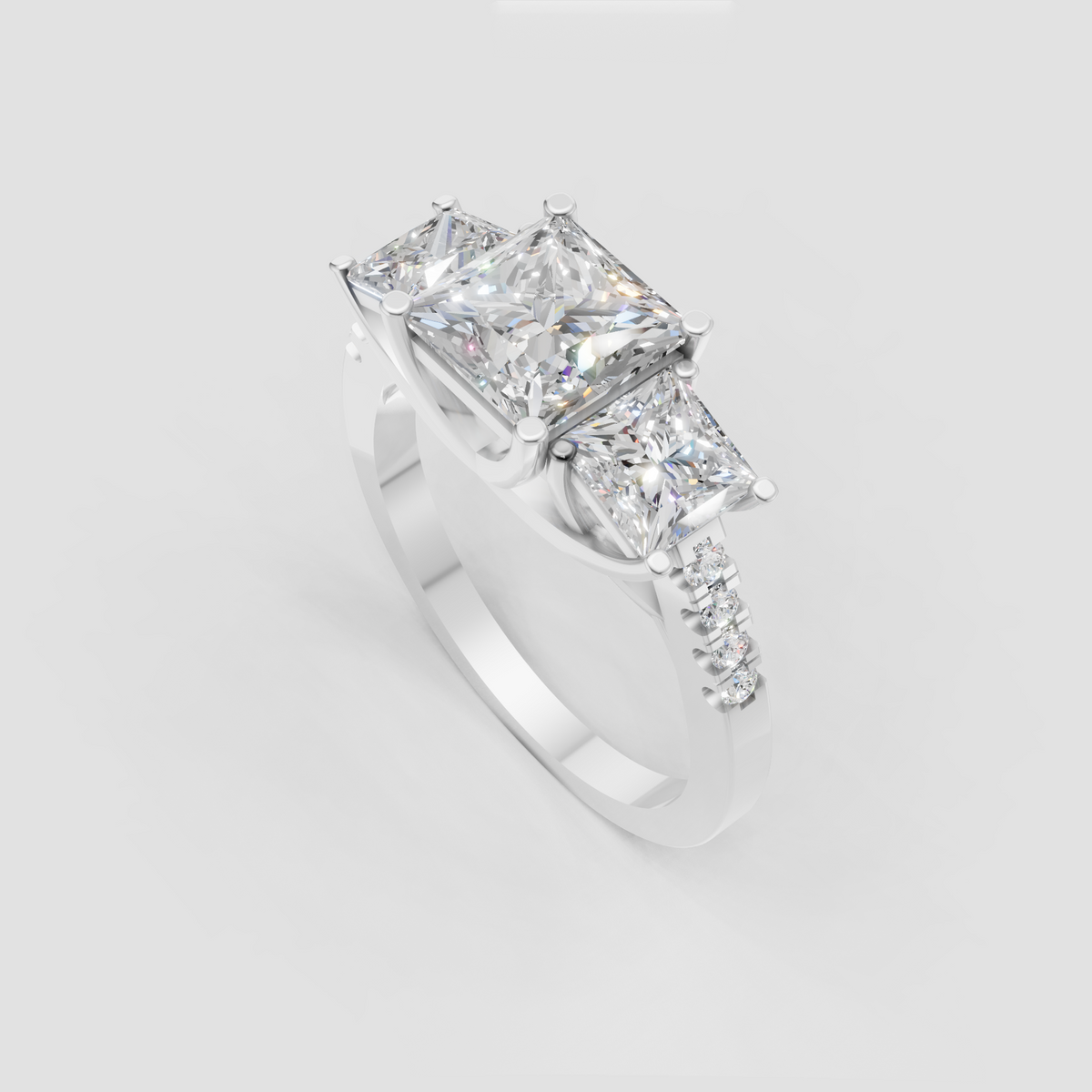 Elegant three stone diamond engagement ring in polished gold