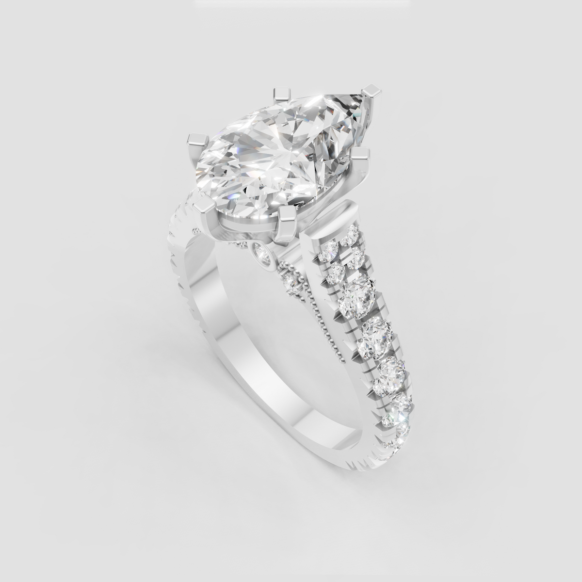 Luxury yellow gold pear diamond engagement ring with ornate gallery