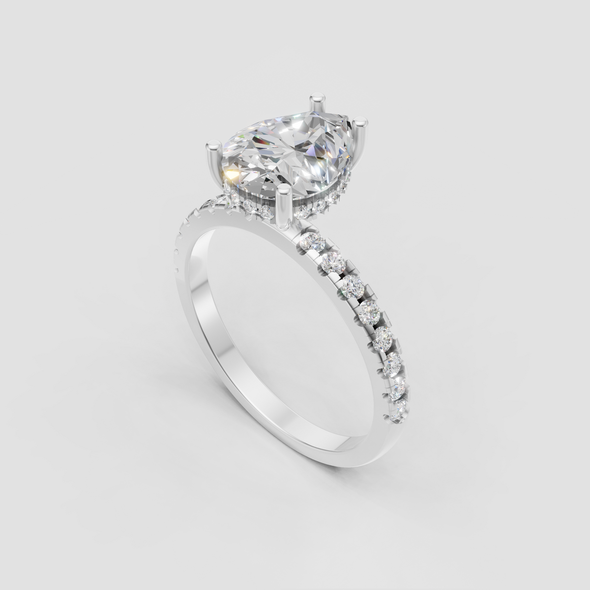 Elegant pear shaped diamond ring with prong set center stone