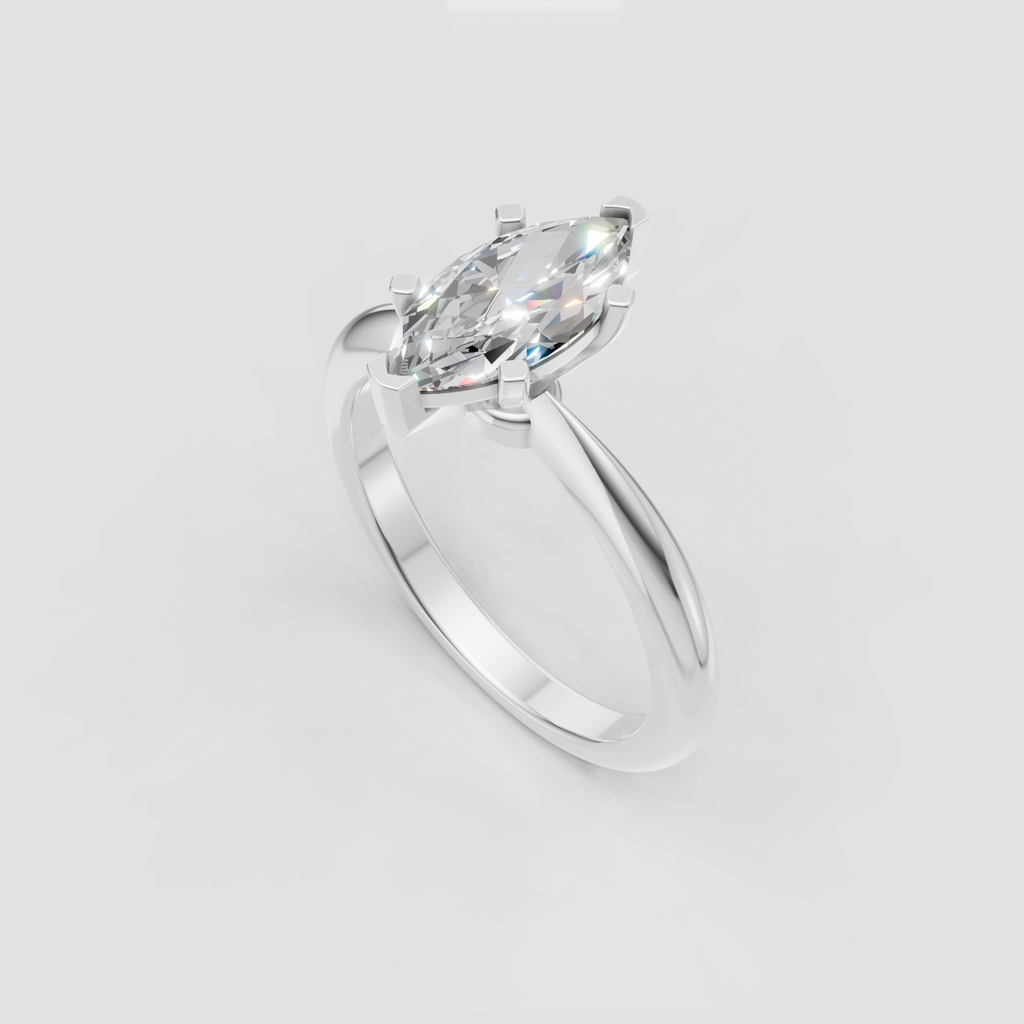 Marquise shaped diamond solitaire ring in polished yellow gold