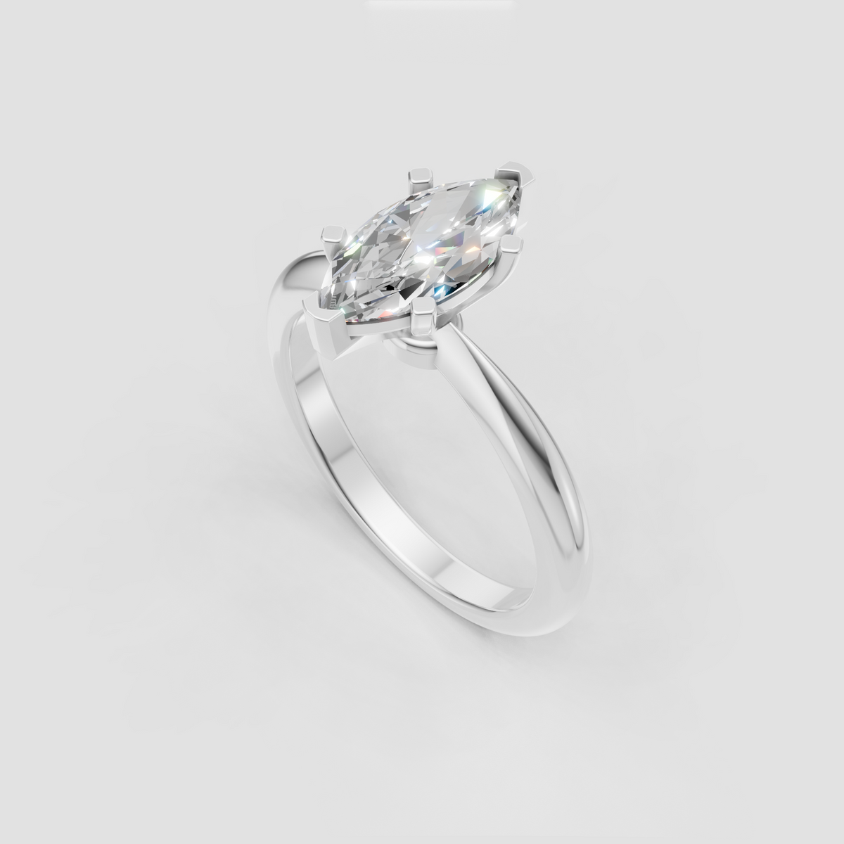 Marquise shaped diamond solitaire ring in polished yellow gold