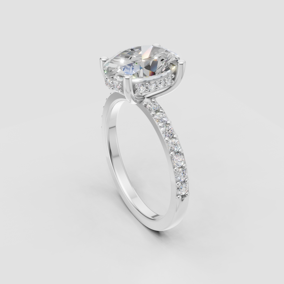 Luxury oval diamond ring with concealed halo and pavé shank