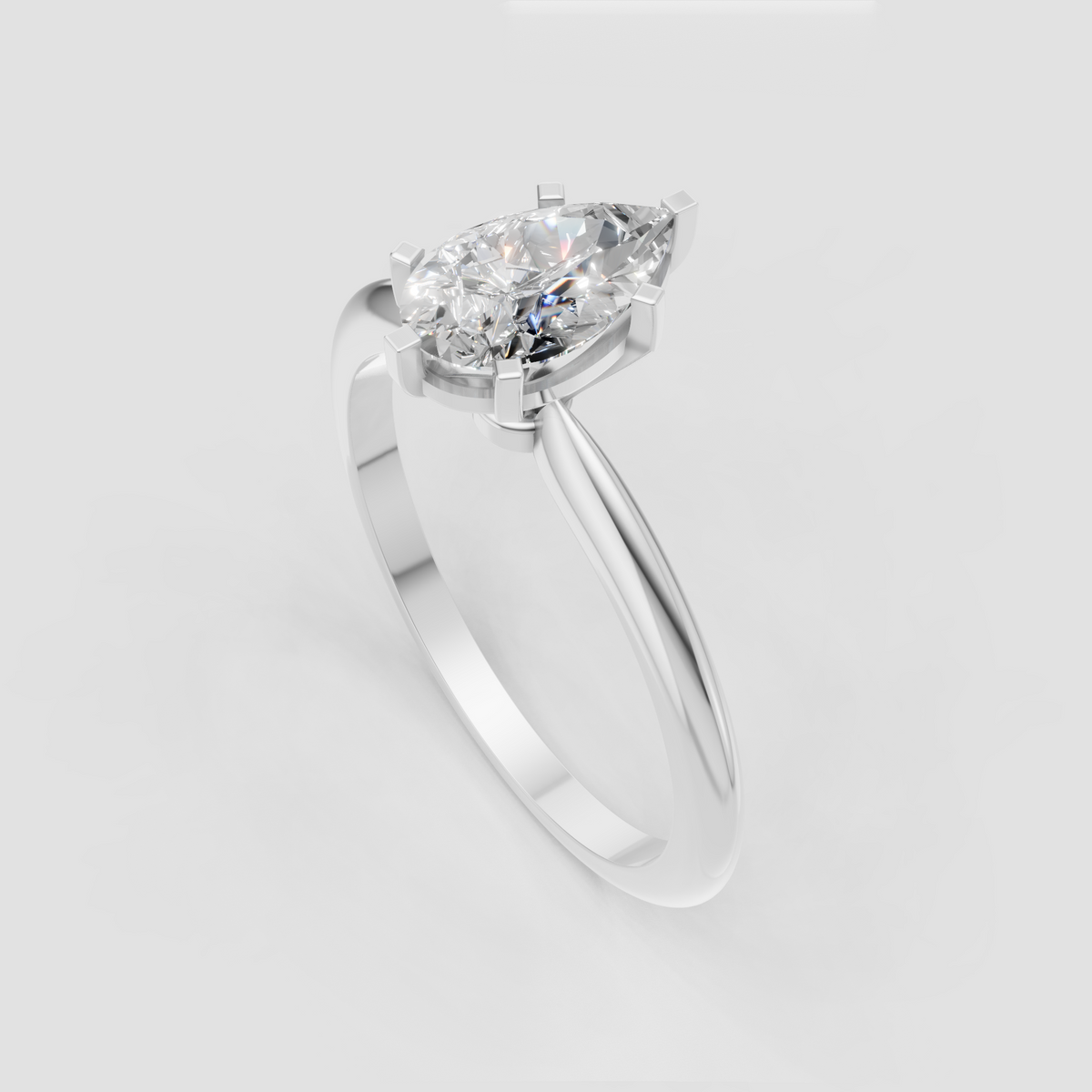 Elegant pear diamond engagement ring in polished gold
