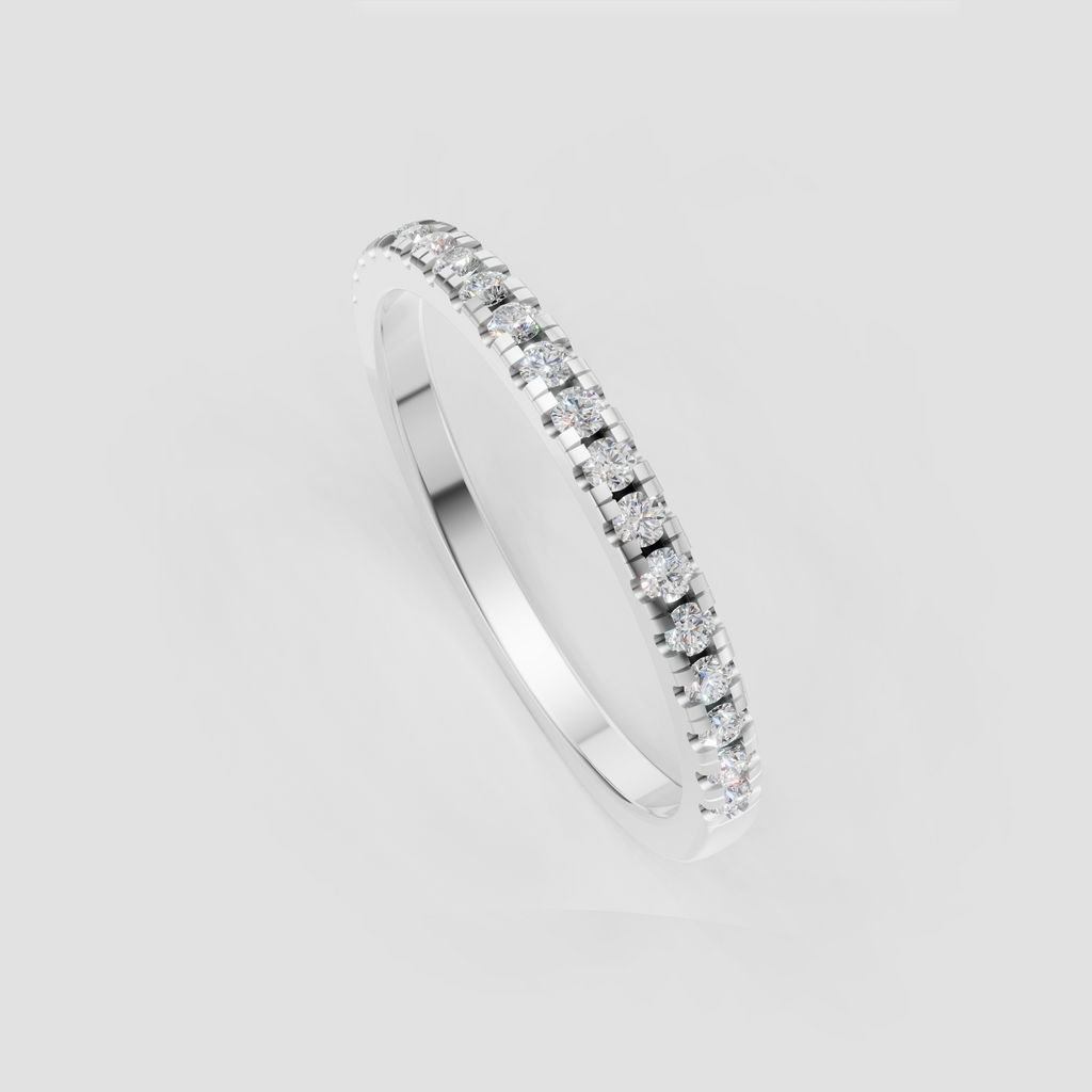 Slim yellow gold diamond band with channel-set round stones
