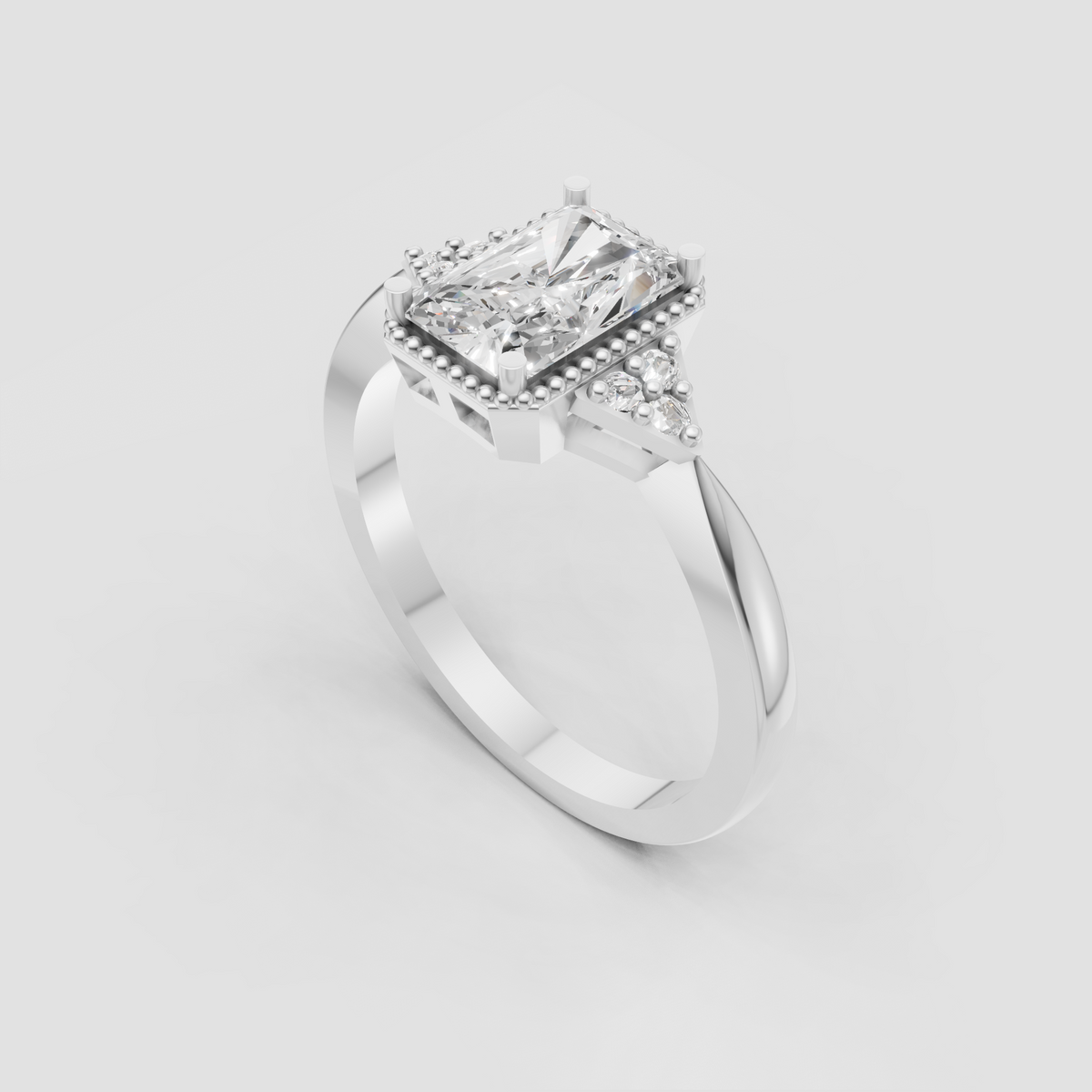 Rectangular diamond engagement ring with intricate beaded halo border