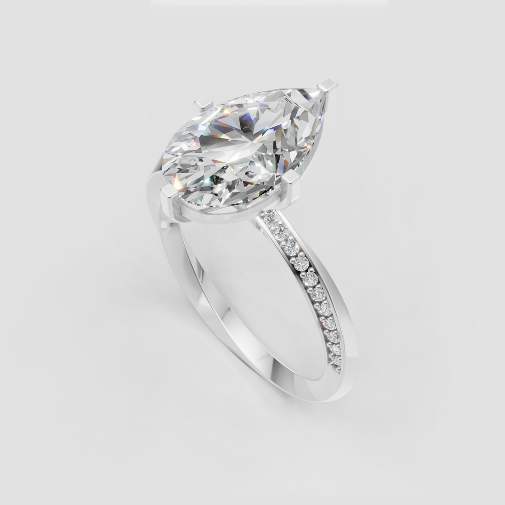 Elegant pear cut diamond bridal ring