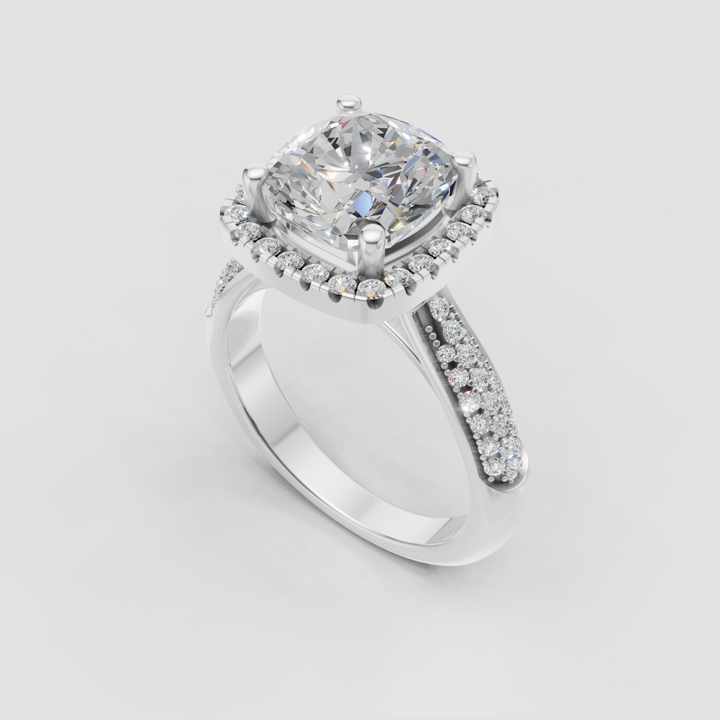 Cushion cut halo engagement ring with pavé-set yellow gold band