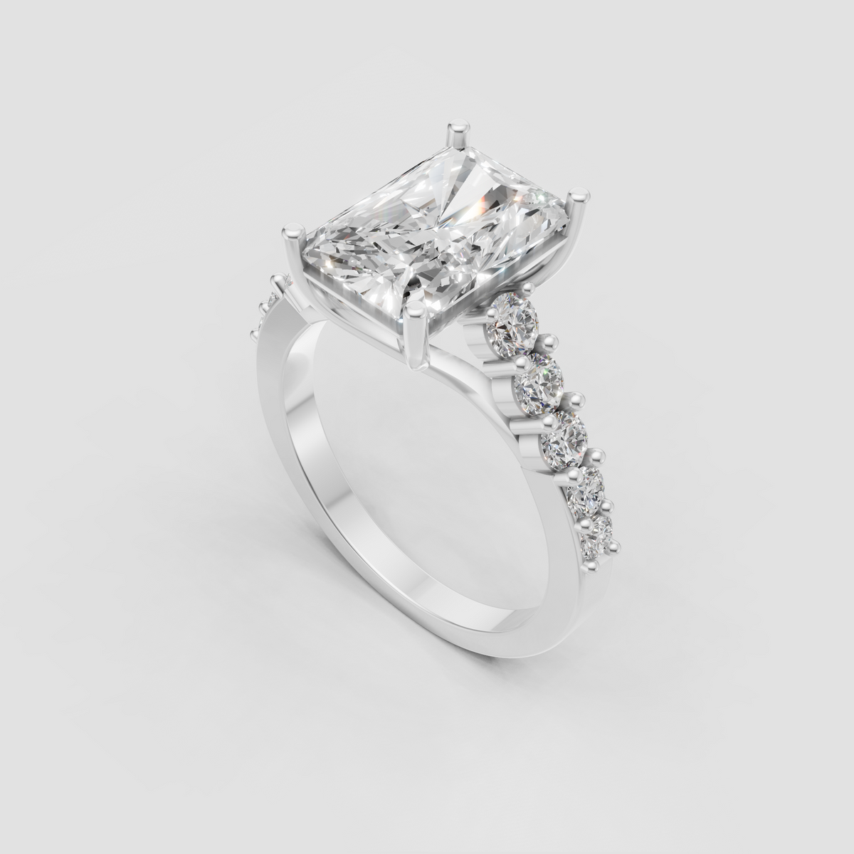 Radiant diamond engagement ring with four-prong yellow gold setting