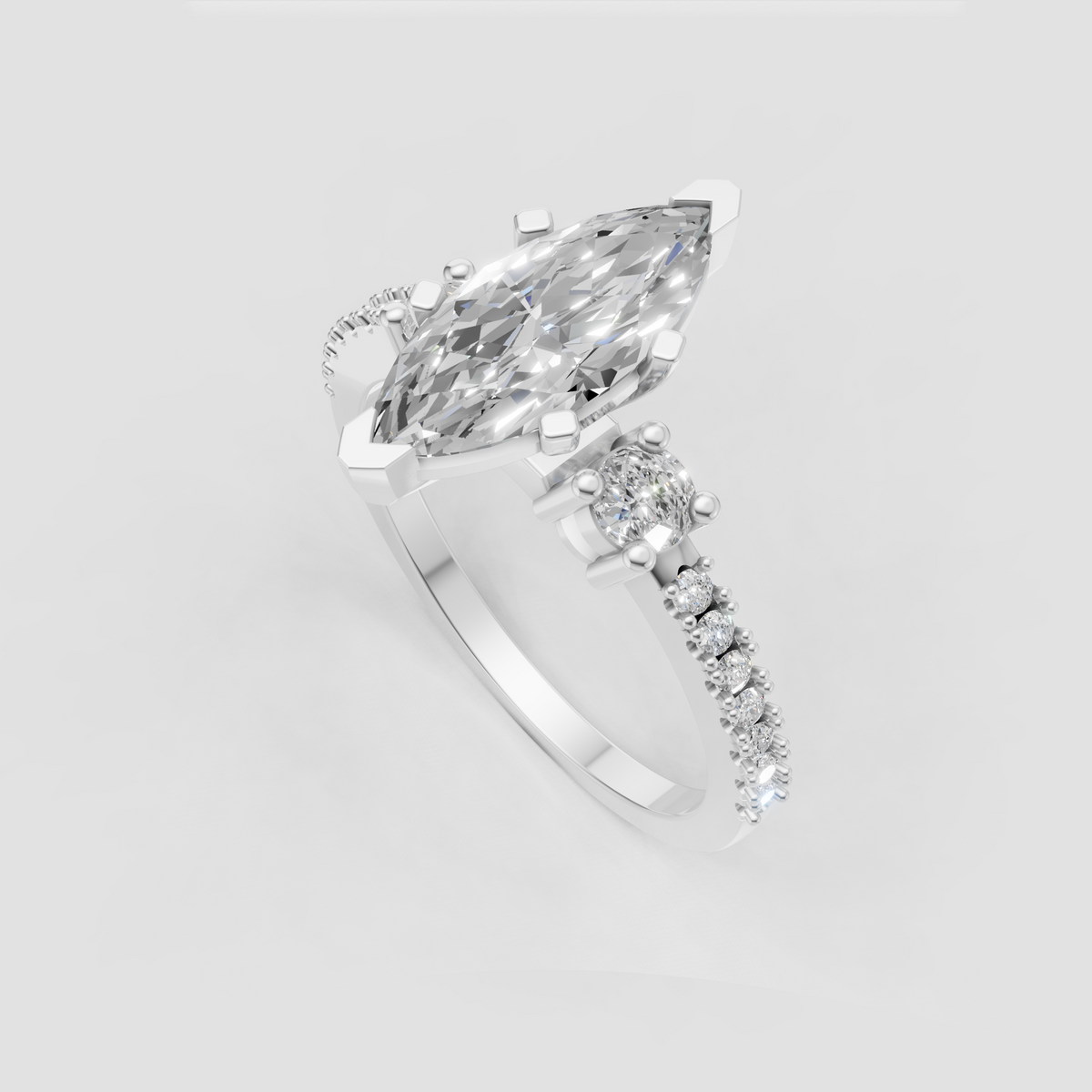 Yellow gold marquise diamond engagement ring with round accent stones