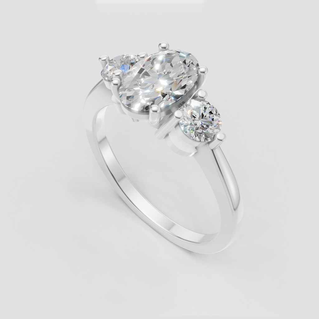 Three stone oval diamond ring with vintage-inspired filigree