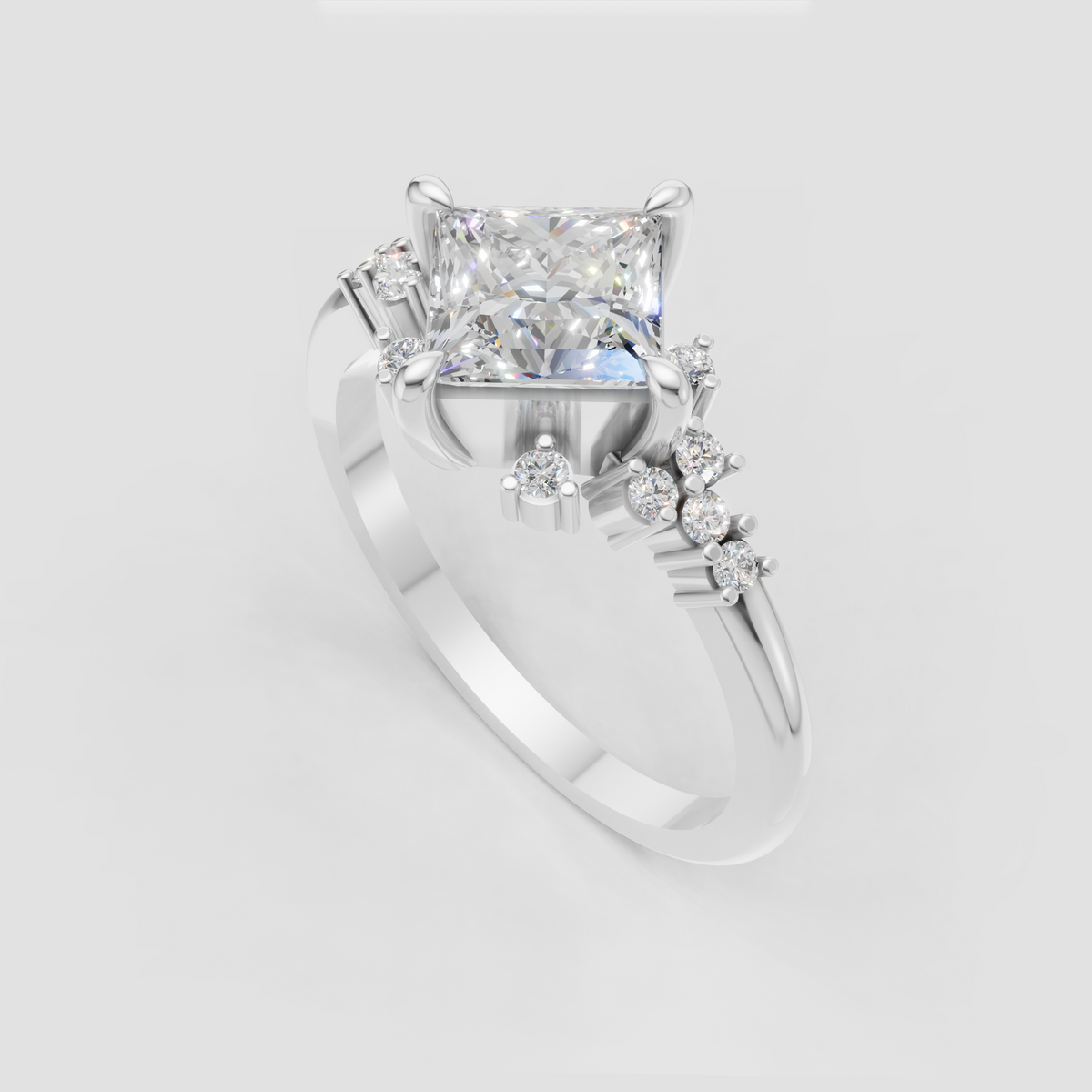 Yellow gold cathedral engagement ring featuring a princess cut center