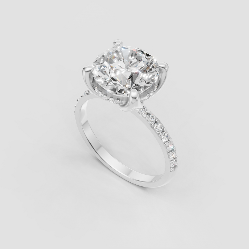 Round Diamond four-prong engagement ring with delicate pavé-set shoulders