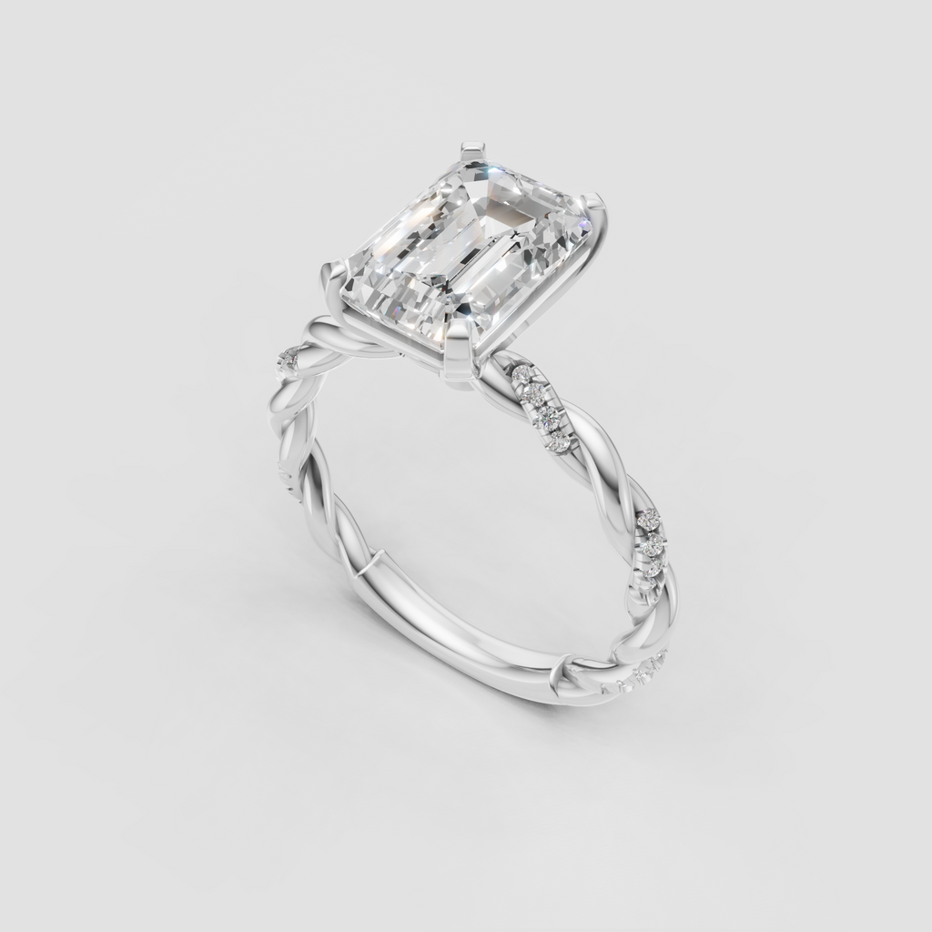 Emerald cut center diamond ring with sculpted gold corner prongs