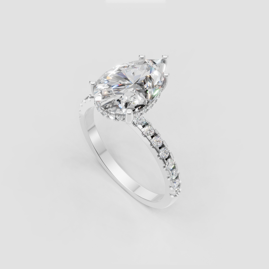 Pear Diamond four-prong engagement ring with slender pavé-set shoulders