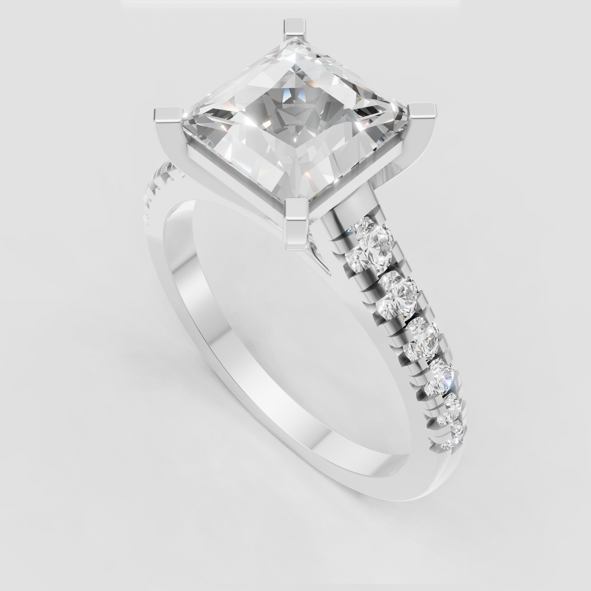 Luxury yellow gold radiant engagement ring with sparkling side stones