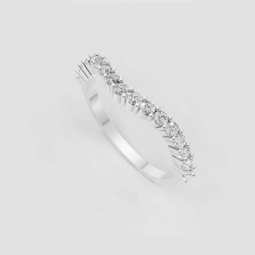Close-up of round diamonds in a yellow gold bar setting
