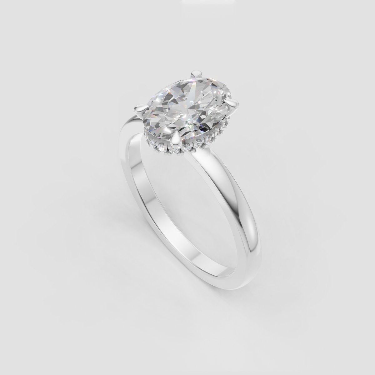 Yellow gold oval engagement ring with four elegant prongs